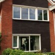 Deze woning voorzien van een nieuwe voorgevel.